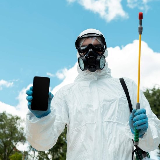 cleaning-specialist-in-hazmat-suit-and-respirator-2024-11-19-10-35-45-SLWJLGV.jpg